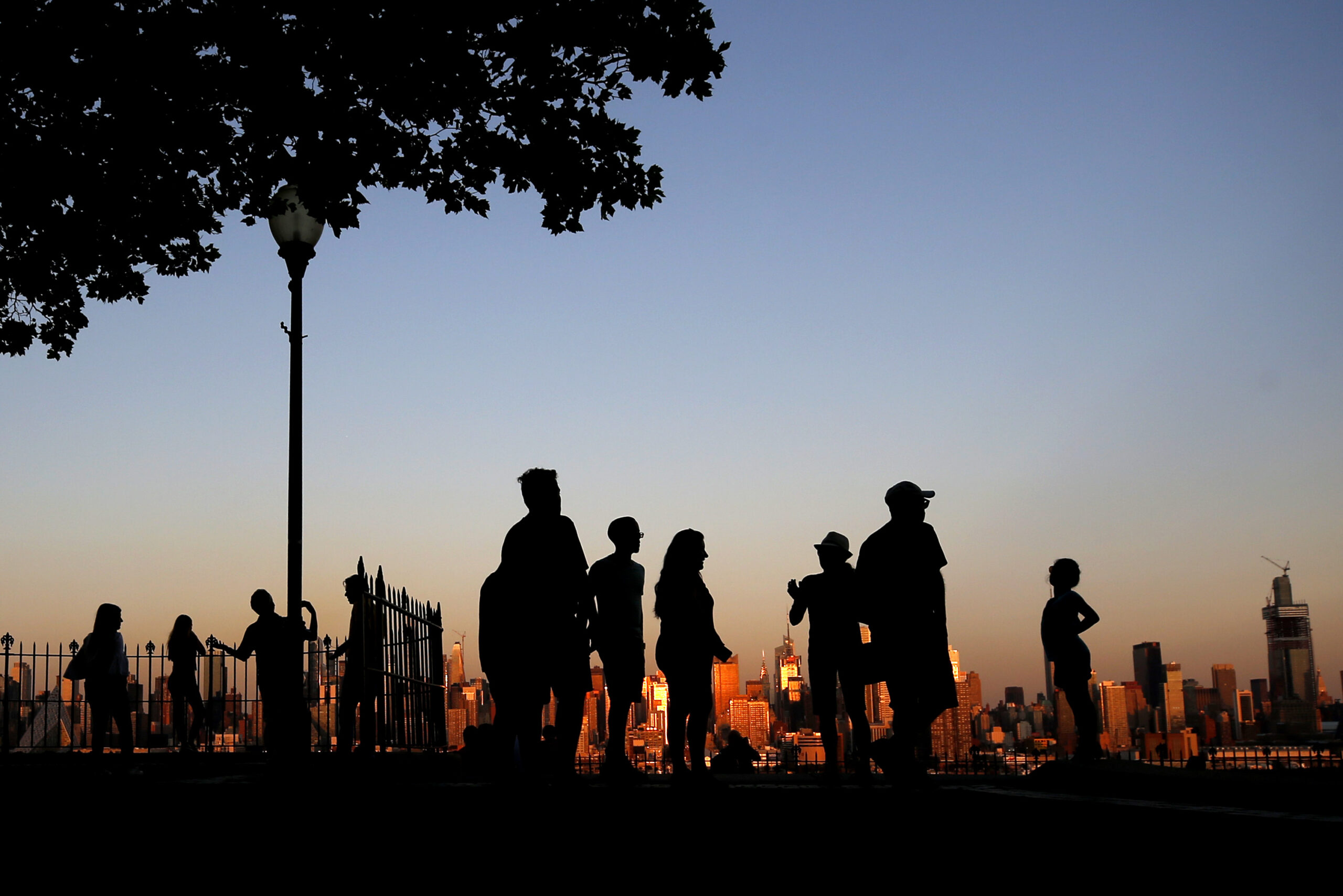 More than half of US under heat, flood advisories
