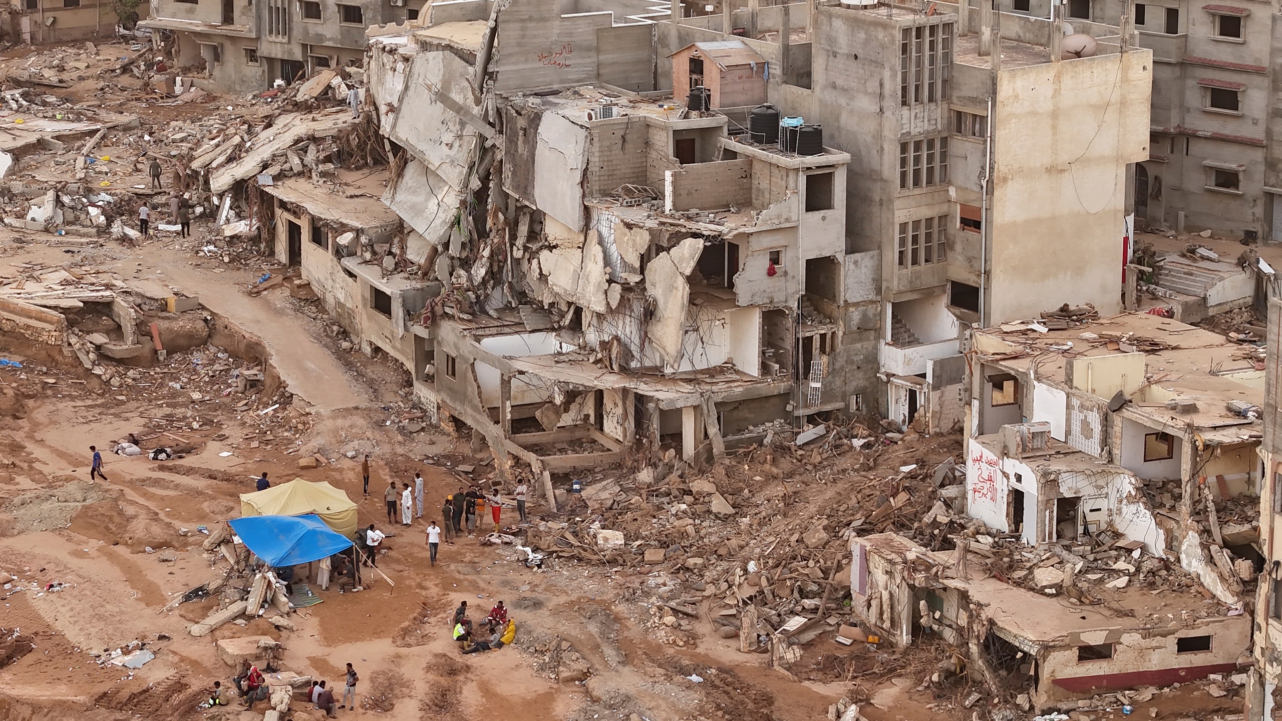 Libya orders 8 officials arrested after flood