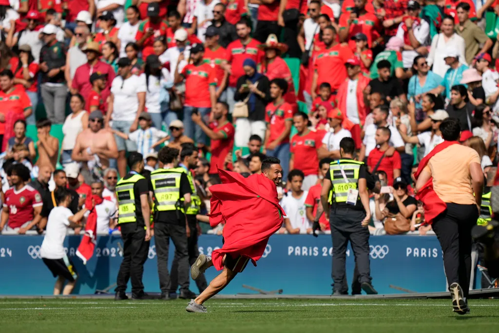 Moroccan fans stormed the pitch during Olympic soccer