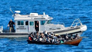 Aid group says armed boats attack migrant rescue ship off Libya