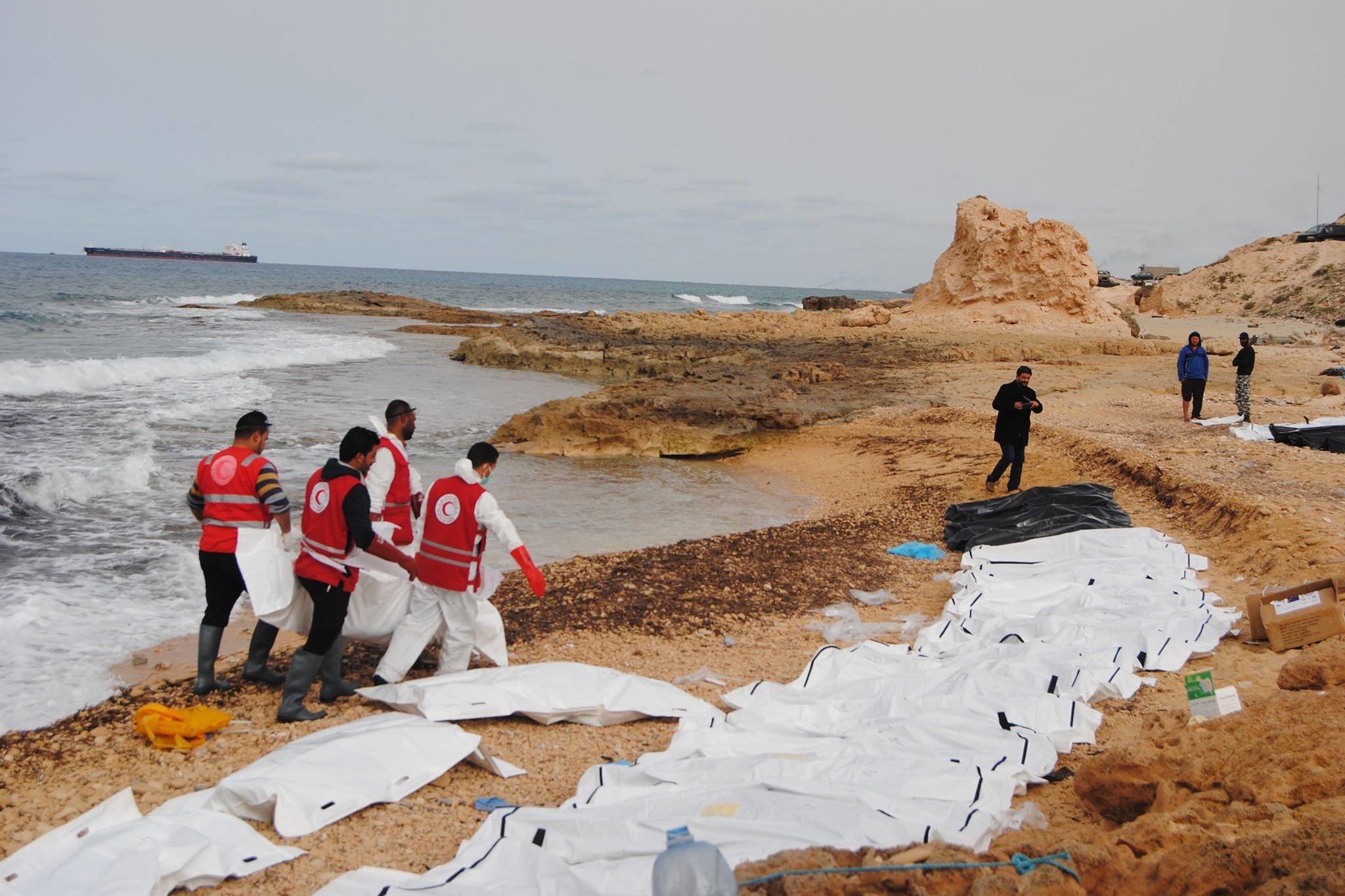 Libyan medics recover 61 migrant bodies along western coast