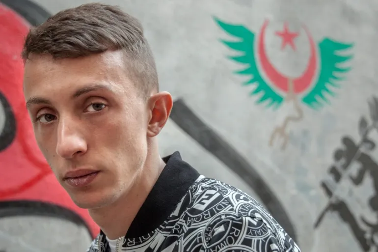 Algerian poet Mohamed Tadjadit jailed for five years over activism