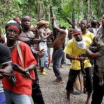 Gunmen kill 25 in twin attacks in Northeast Nigeria