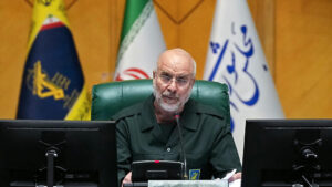 Iran defies US, reviews plan but refuses negotiations