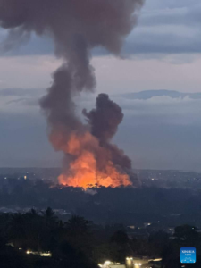 At least 13 dead as army arsenal erupts in Burundi capital