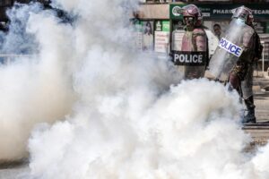 Kenya police tear gas Nairobi park protest, arrest former chief justice