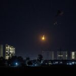 Drone attacks hit Iran’s neighbours after Trump pauses strikes