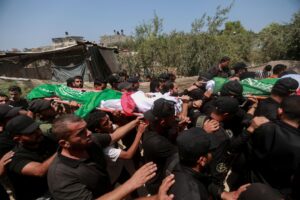 Gazans bury 112 members of one clan recovered from rubble