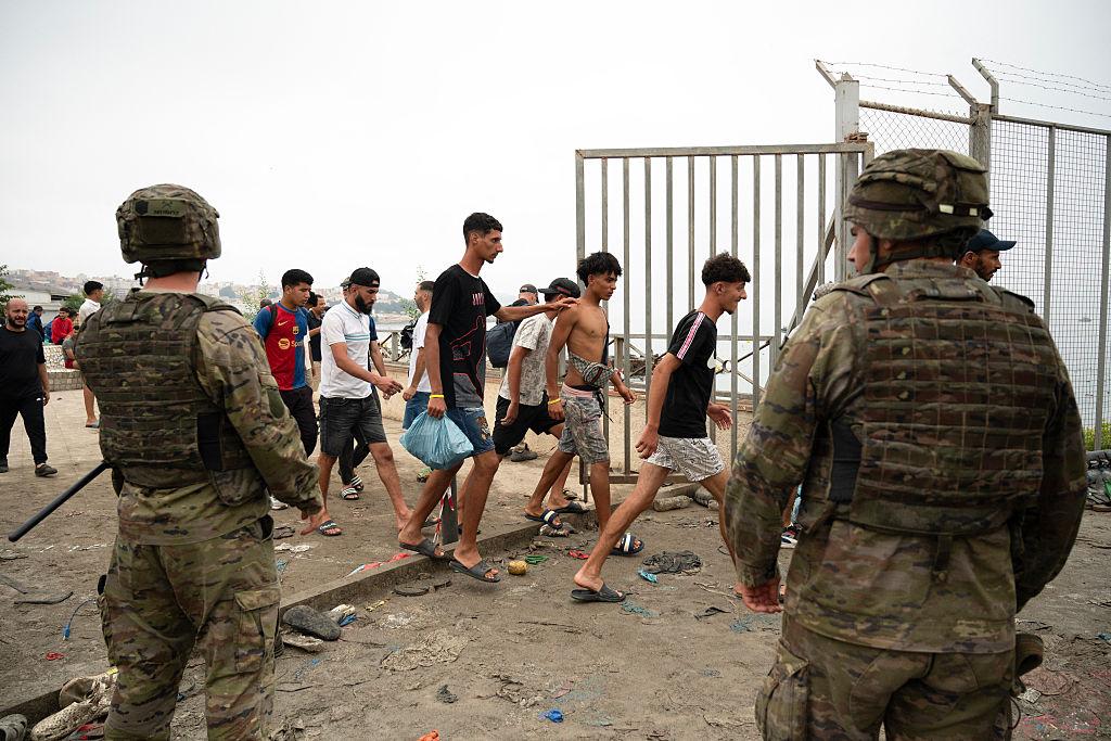 Ceuta migrants turn back after food shortages and hostility